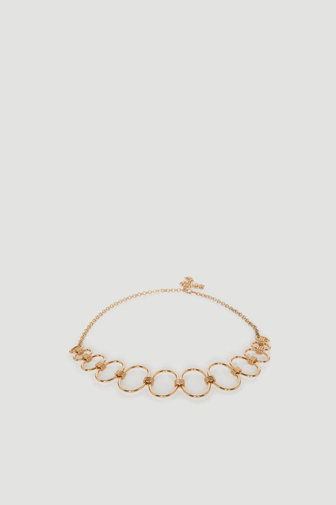 Gold-tone chain belt featuring interconnected circular links with adjustable clasp closure for a polished finish