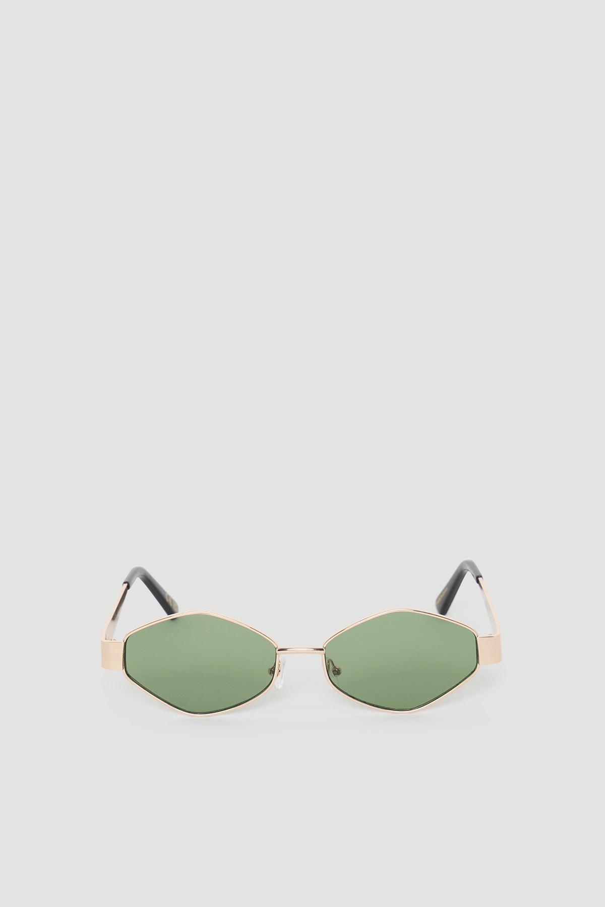 Gold-tone framed sunglasses featuring unique hexagon-shaped green lenses with black temple tips for a modern look