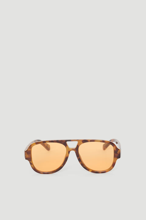 Stylish aviator sunglasses with tortoiseshell frames and warm amber lenses for a modern, versatile accessory.