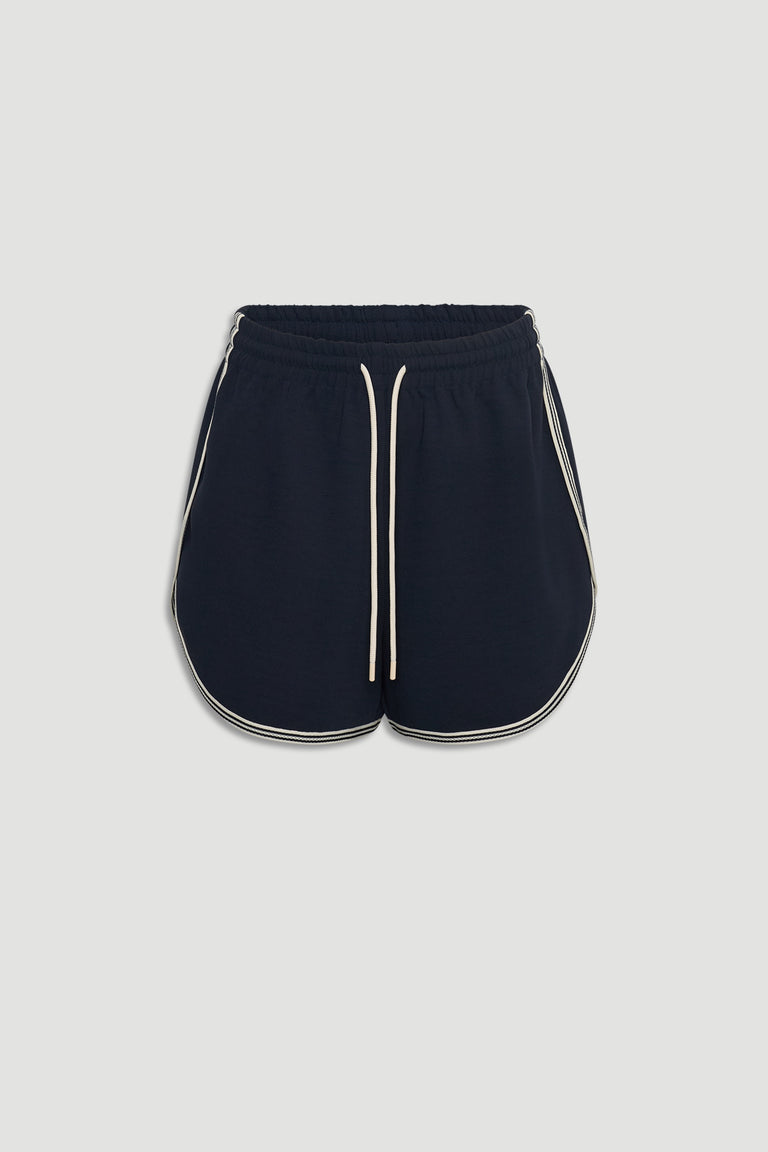 Navy runner-style shorts with contrast white racer stripes and adjustable drawstring waist for casual comfort.