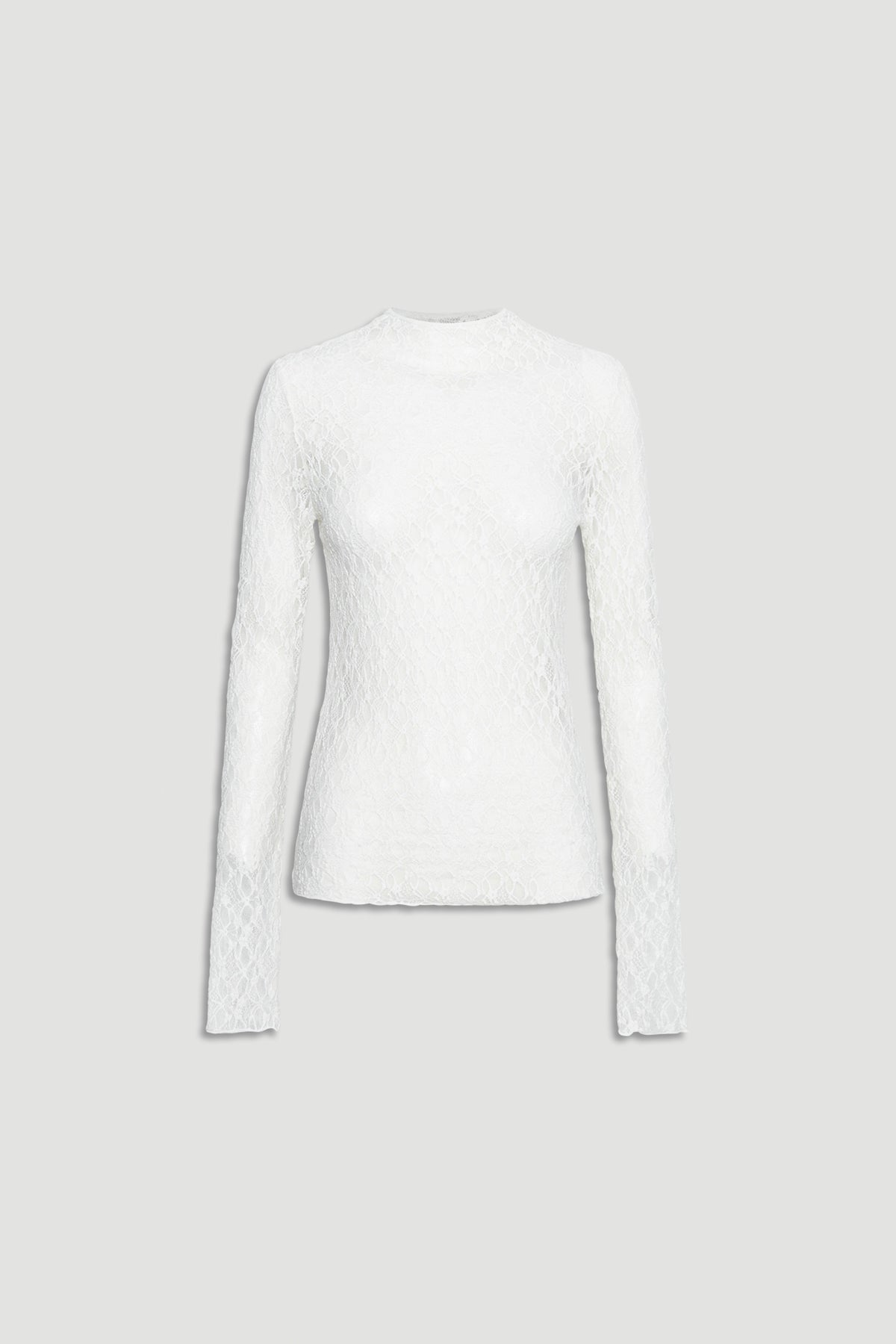 White fitted long sleeve top with delicate lace texture and a subtle high neckline for elegant layering