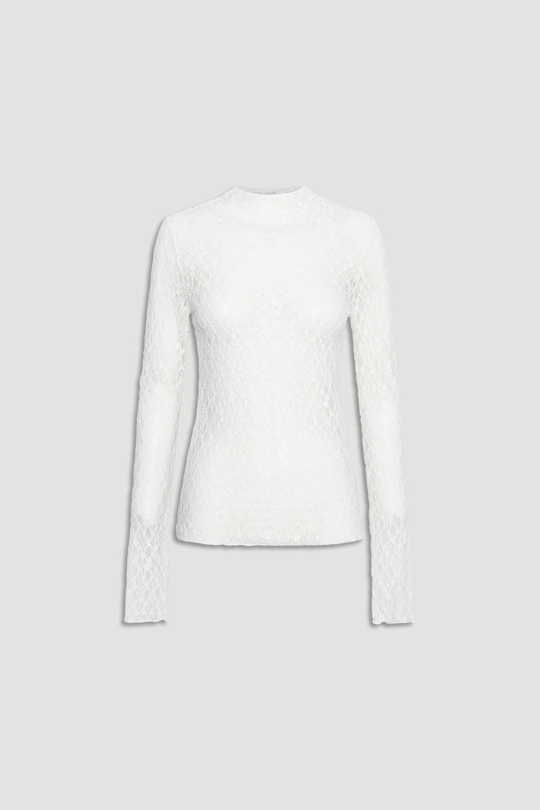 White fitted long sleeve top with delicate lace texture and a subtle high neckline for elegant layering