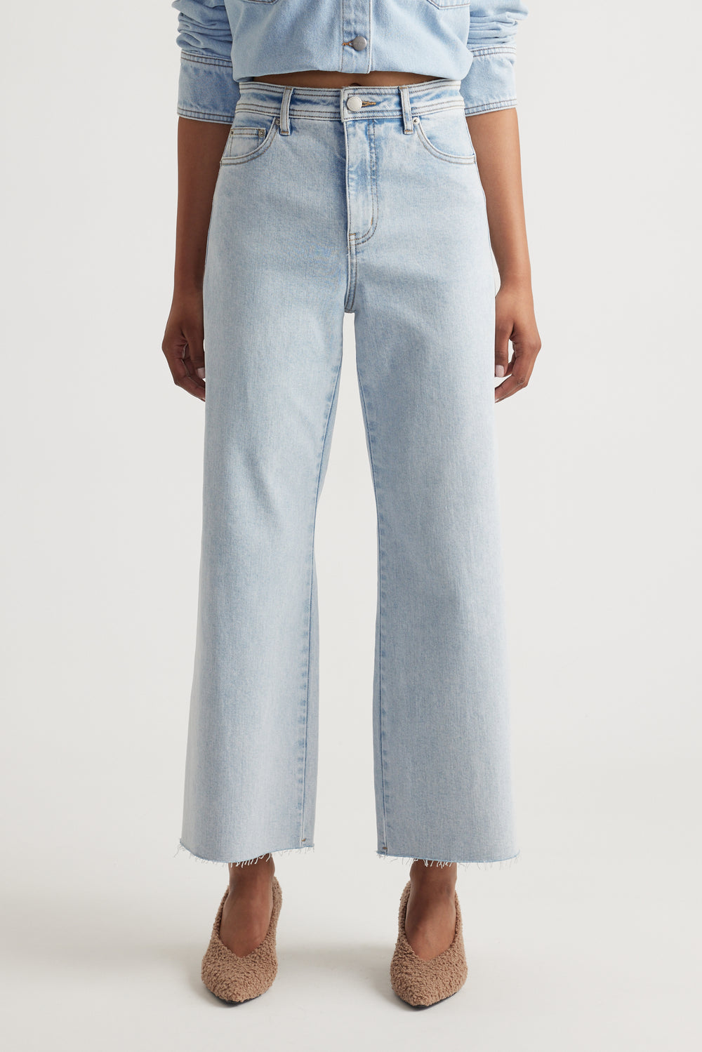 Front view of Tahni Wide Leg Jean in light wash denim with high waist and relaxed fit by Decjuba Australian brand