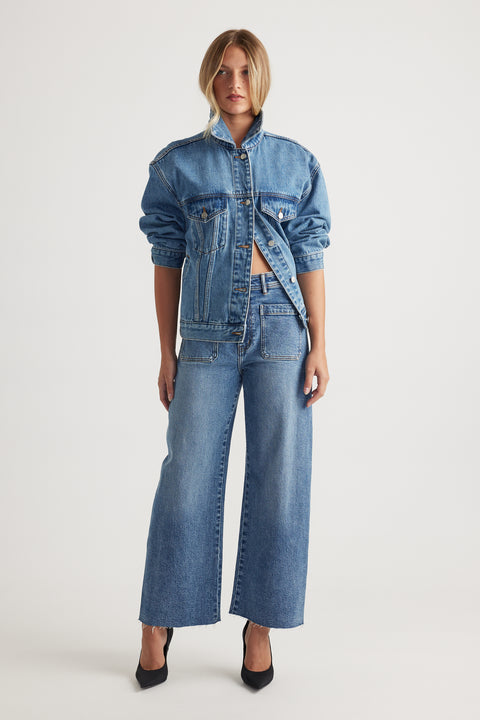 Darcy Cropped Wide Leg Jean in classic blue denim with patch pockets and high waist, styled with cropped denim jacket by DECJUBA Australian brand