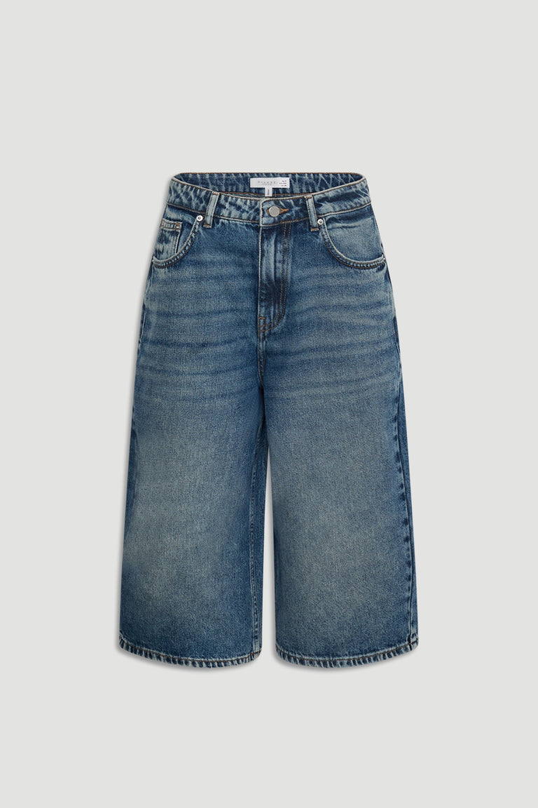D-Luxe Denim Long Line Short in mid rise faded blue denim with button & fly closure, gallery position 4, portrait view