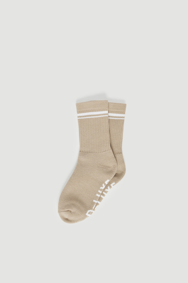 Beige ribbed quarter crew socks with white stripe detailing and soft feel