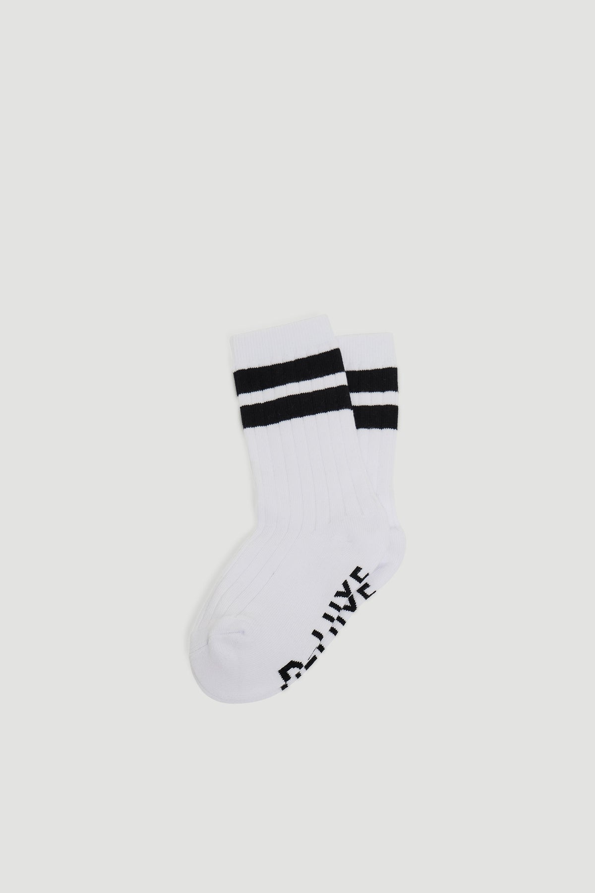 D-Luxe Aria Wide Stripe Socks in portrait view, ribbed quarter crew length with black stripes on white background
