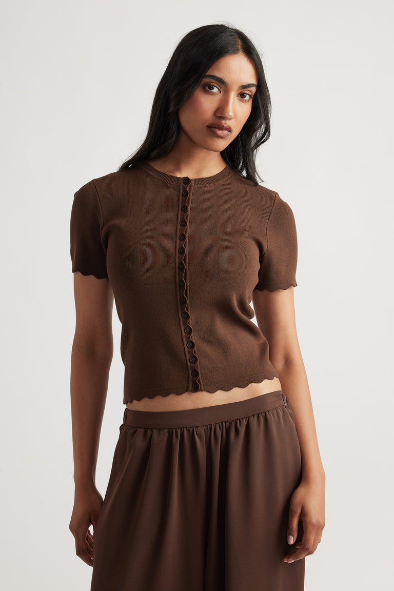 Maya Scallop Trim Button Top in rich coffee brown with short sleeves and delicate scalloped edges for a refined look.
