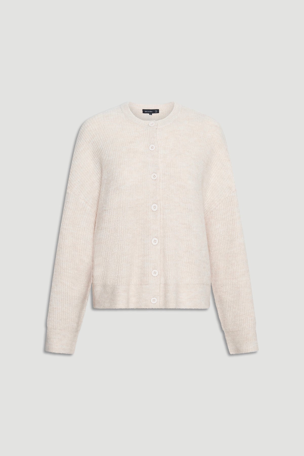 Soft textured cream knit cardigan with full button front and relaxed long sleeves for cozy layering.