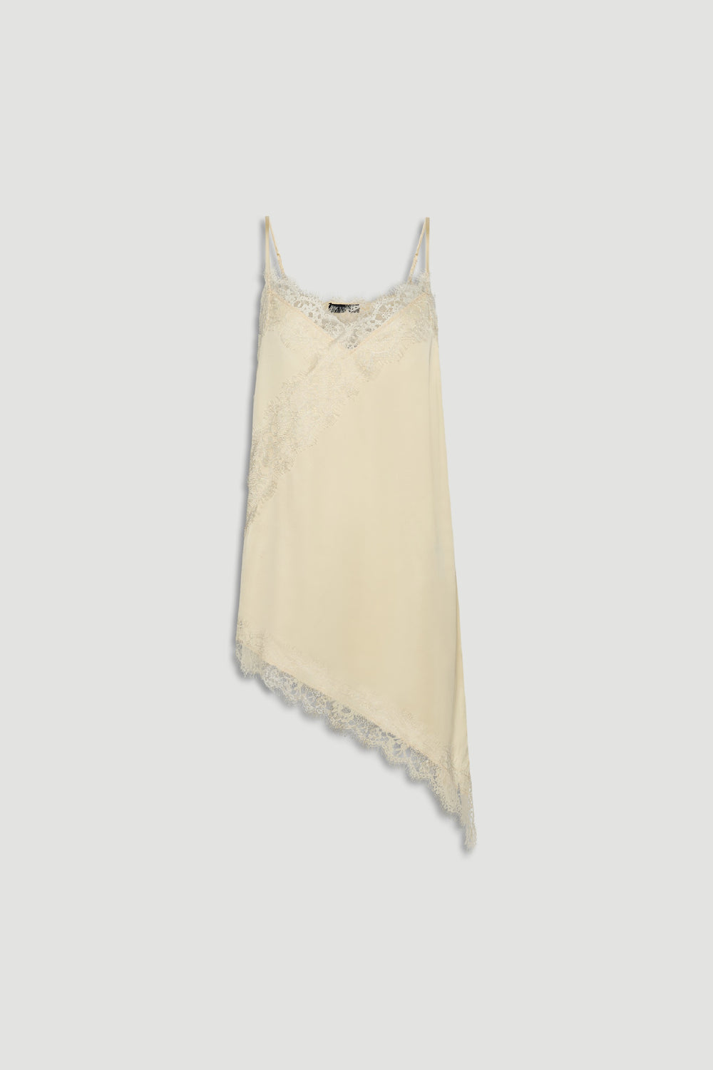 Karla Lace Tunic in soft cream featuring delicate lace trim and an asymmetric hem, made from 100% viscose and nylon by DECJUBA Australian brand