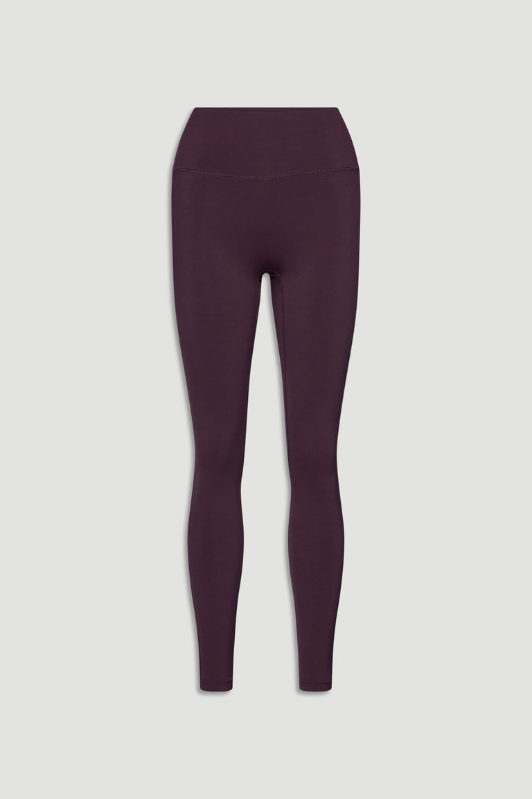 High-rise, slim-fit legging in deep berry hue with smooth, seamless finish for versatile everyday wear
