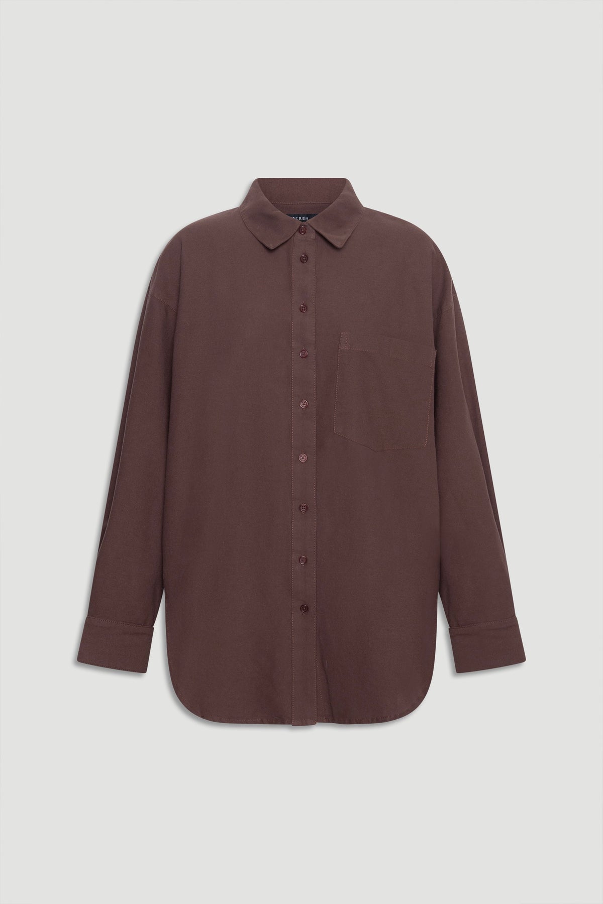 Oversized oxford shirt in muted brown with classic collar, front buttons, chest pocket, and long cuffed sleeves