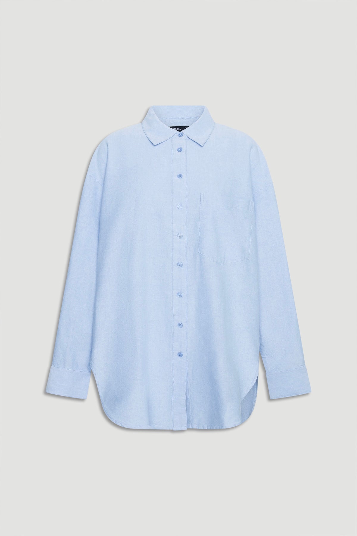 Light blue oversized shirt with classic collar and button-down front in a relaxed, versatile style designed for daily wear.