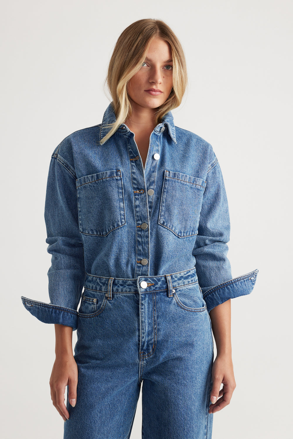 Ariana Denim Shirt in classic mid-blue wash with button front and chest pockets by DECJUBA Australian fashion brand