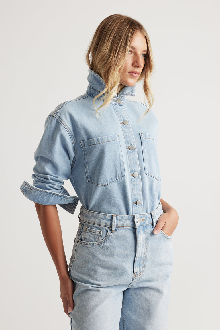 Ariana Denim Shirt in light wash denim with button front, high collar, and relaxed fit by DECJUBA Australian fashion brand