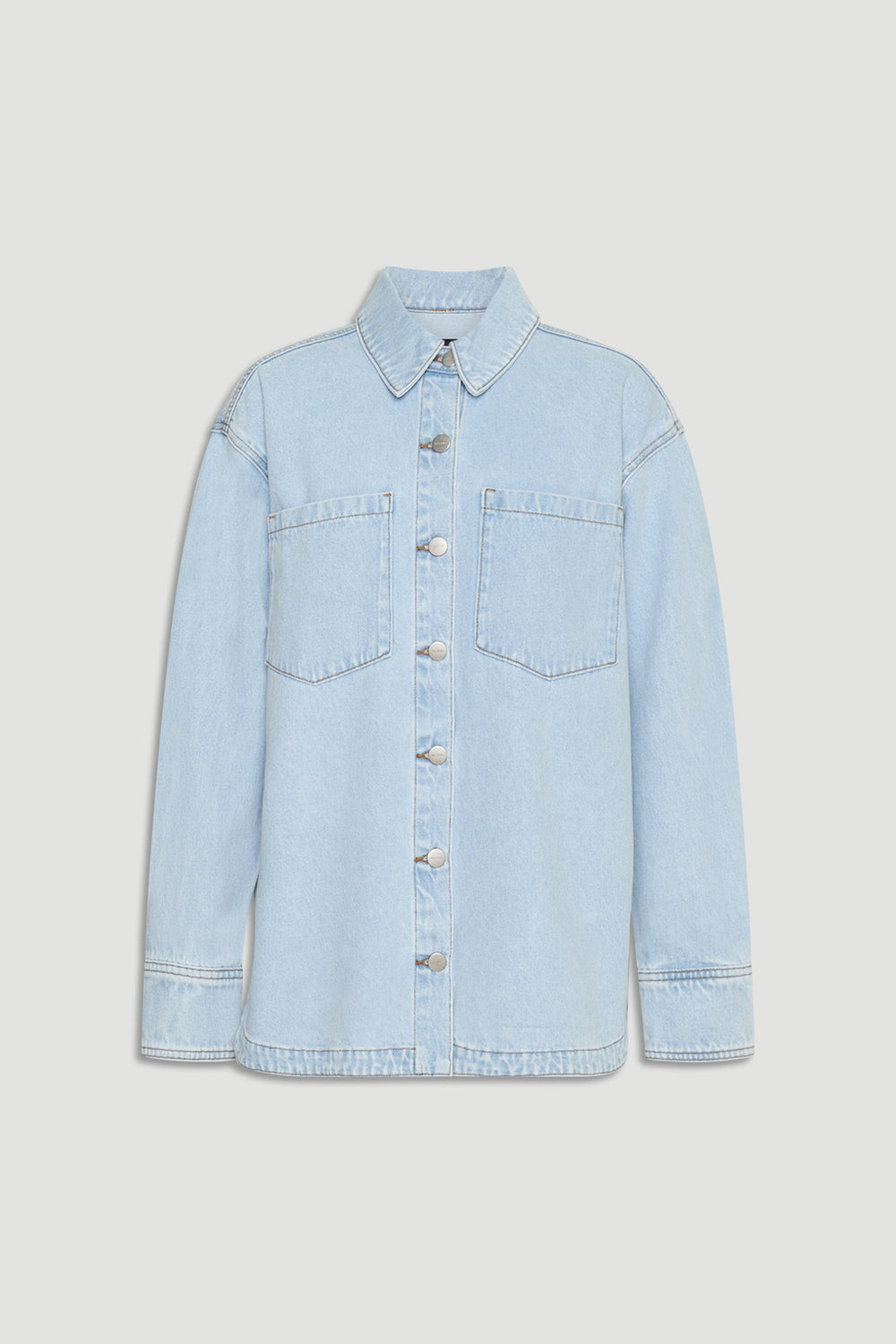 Ariana Denim Shirt in light blue wash with front button closure and patch pockets by DECJUBA Australian fashion brand