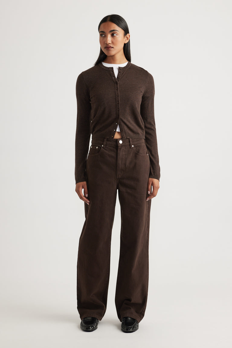 Woman wearing Bella Button Through Cardigan in rich chocolate brown with long sleeves and round neckline by DECJUBA.