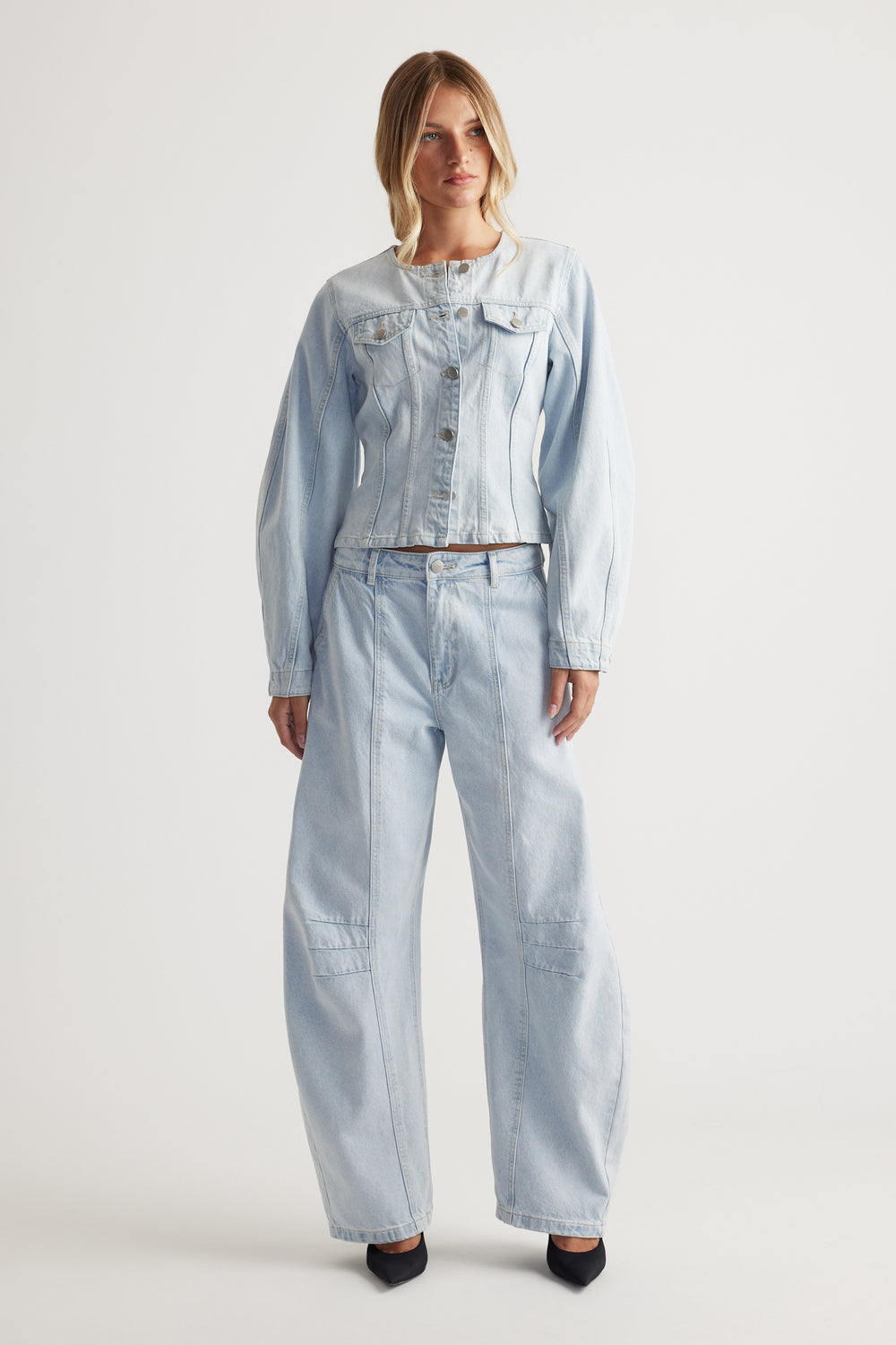 Amaya Barrel Jean in light wash denim with wide-leg silhouette and detailed seam accents by Decjuba Australian fashion brand