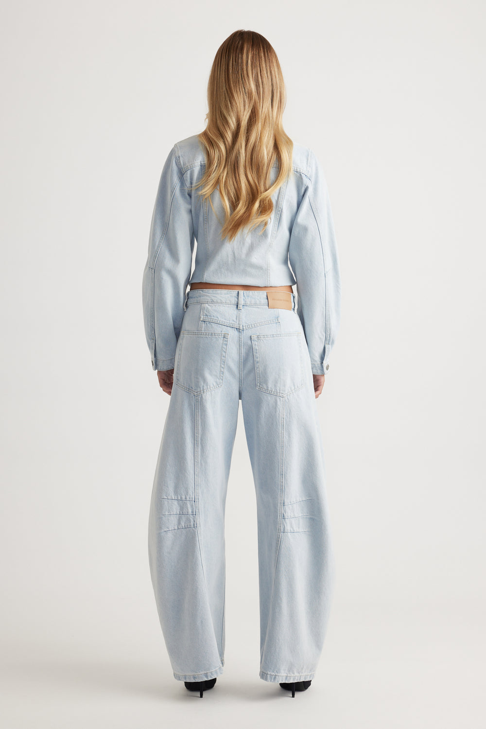 Amaya Barrel Jean in light blue denim with wide-leg cut and subtle stitching details by DECJUBA Australian fashion brand