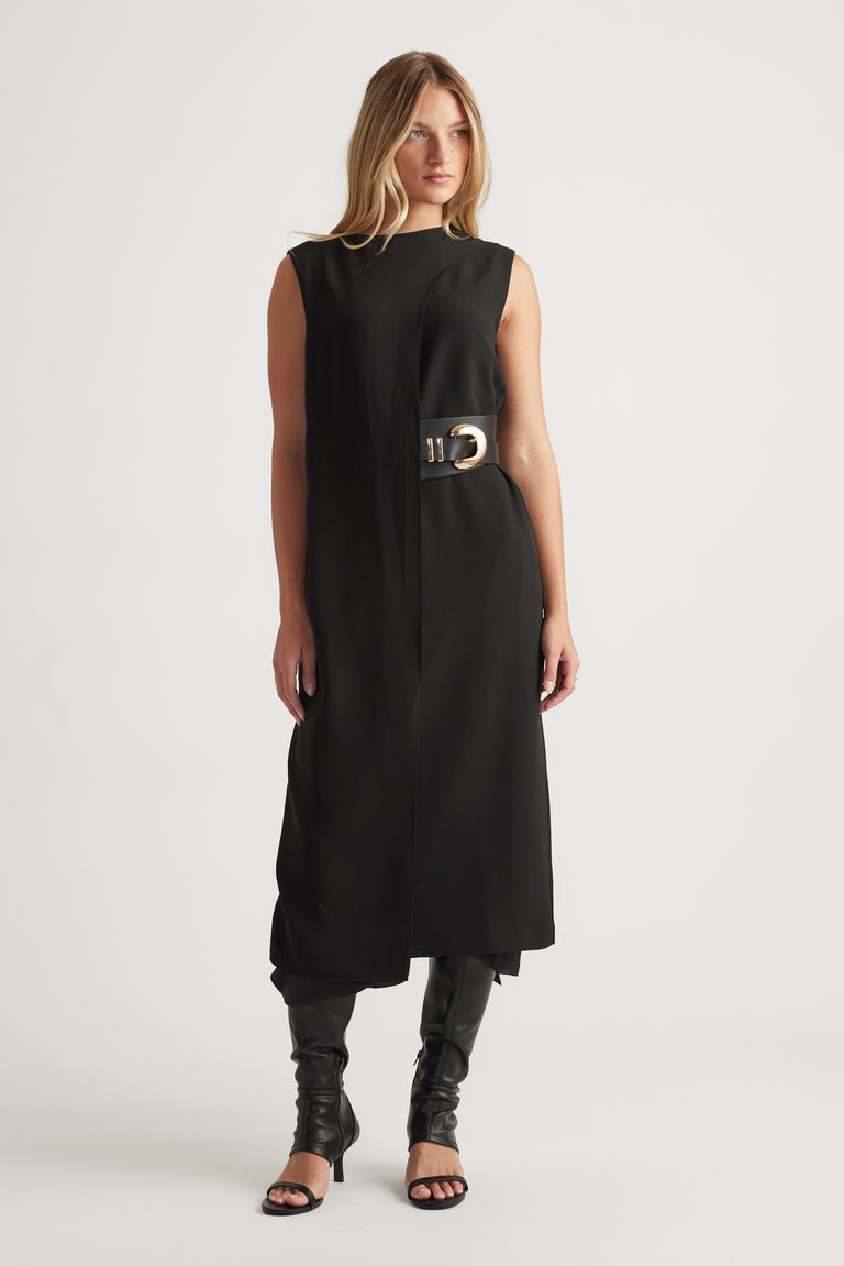 Woman wearing Isla Overlay Midi Dress in black sleeveless design with belted waist and asymmetrical hem by DECJUBA