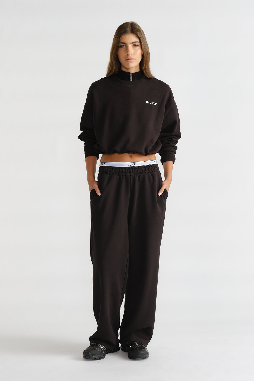 D-Luxe Logo Crop Sweat in black with a relaxed fit, paired with matching loose pants for comfy casual style by DECJUBA