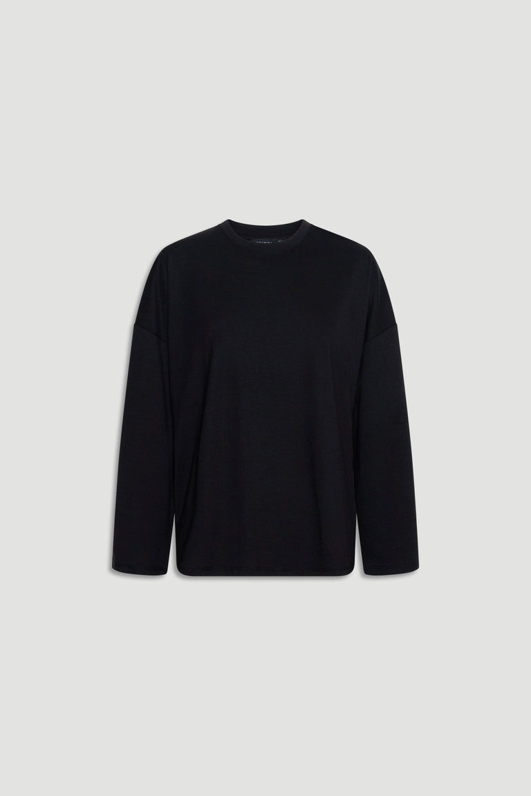 Minimalist black long sleeve top with a relaxed fit and subtle crew neckline for versatile everyday wear