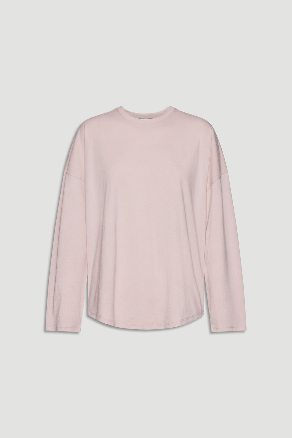 Soft pink long sleeve top with relaxed fit and crew neckline for casual, everyday wear.