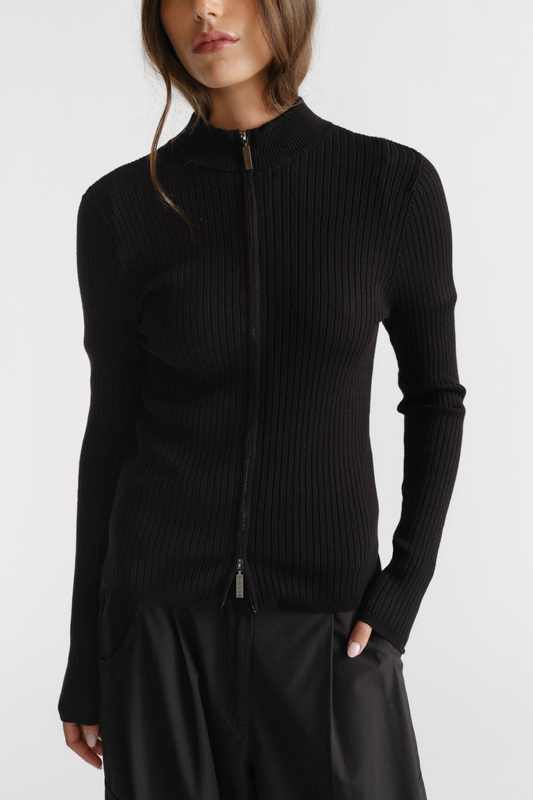 Slim-fit black ribbed D-Luxe Knit Zip Long Sleeve with high neck and full front zipper for sleek layering style.