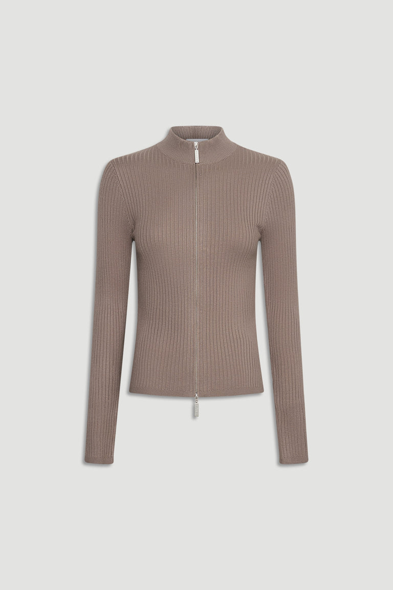 D-Luxe Knit Zip Long Sleeve in a warm dune tone with a sleek ribbed texture and high collar zipper detail
