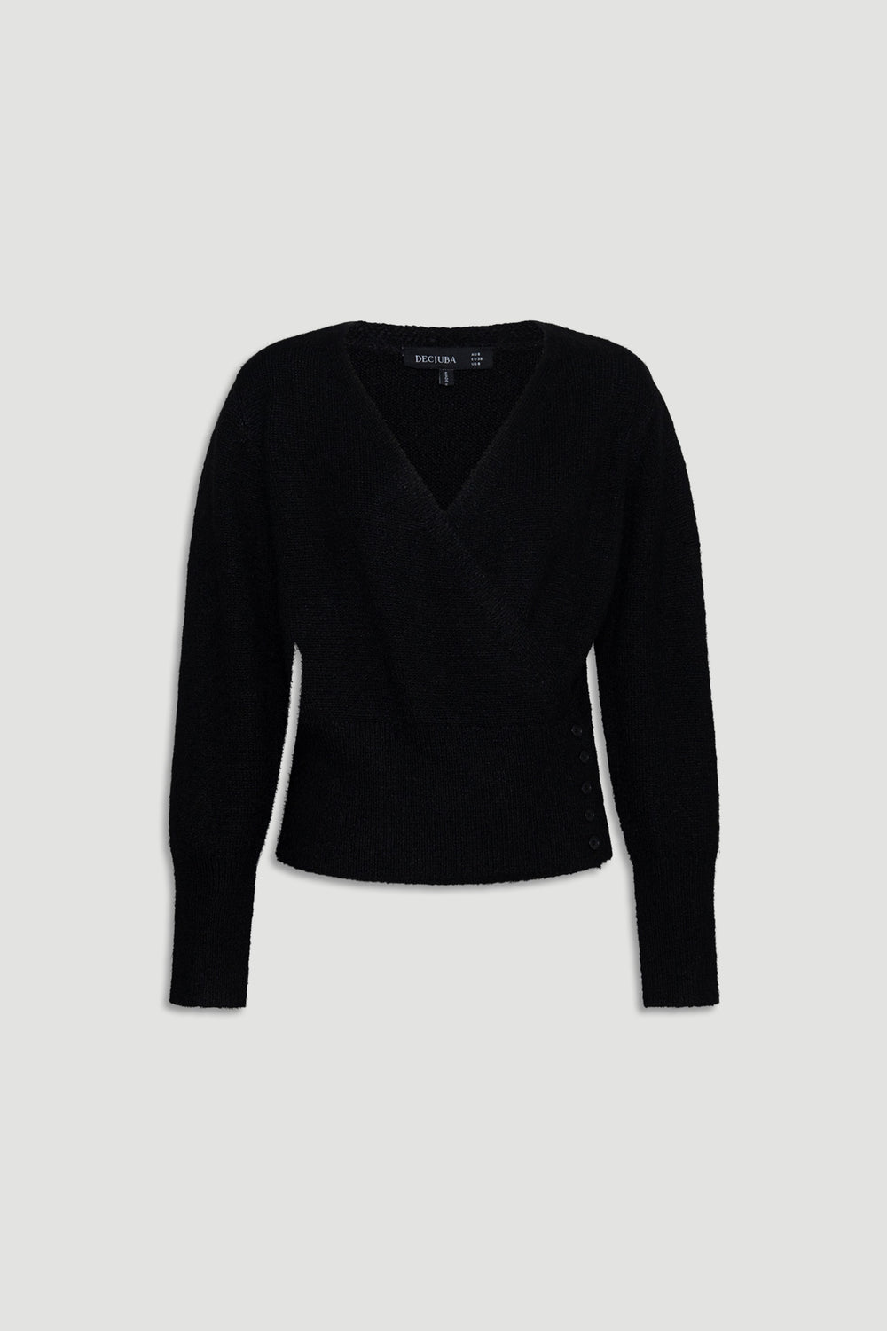 Soft black knit cardigan with a crossover front and subtle button detailing on the side for a flattering fit