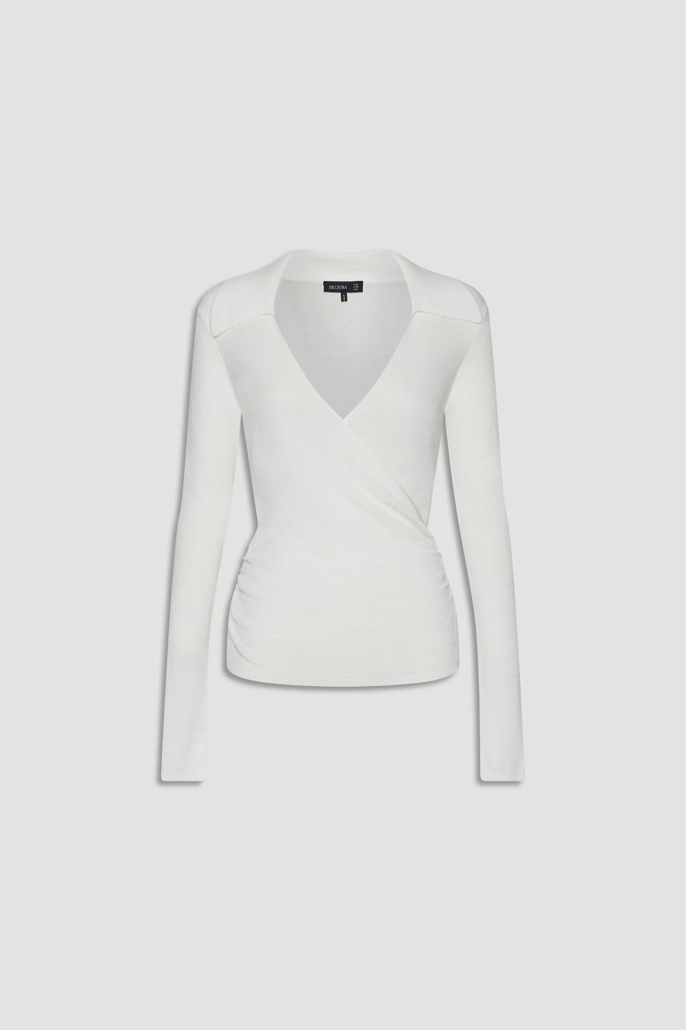 White fine knit crossover top with long sleeves and subtle side ruching for a sleek, versatile look