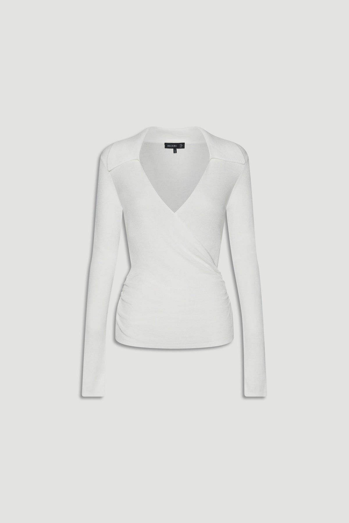 White fine knit crossover top with long sleeves and subtle side ruching for a sleek, versatile look