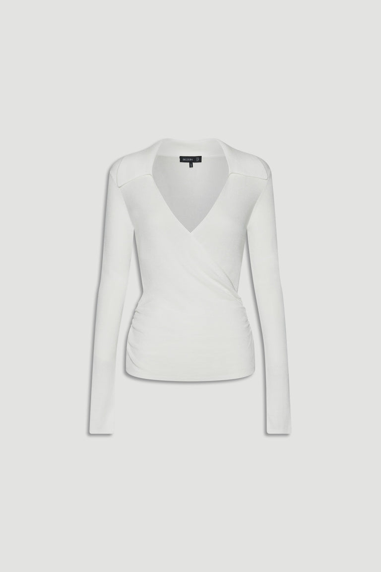 White fine knit crossover top with long sleeves and subtle side ruching for a sleek, versatile look