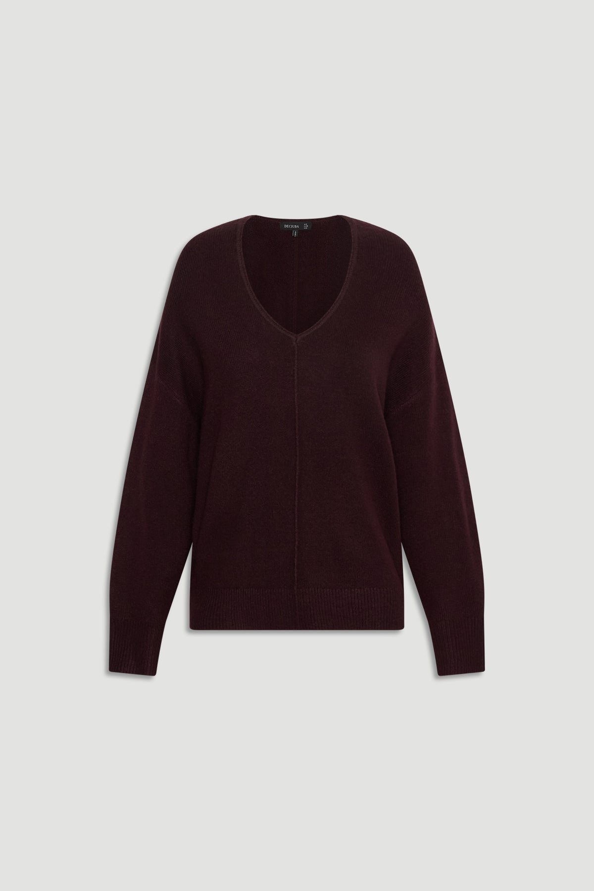 Soft burgundy knit jumper with V-neckline and subtle central seam detail for a relaxed, cozy fit.