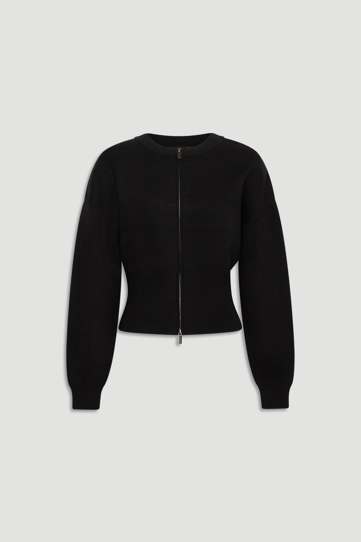Black knit bomber with a cropped fit, featuring a front zip closure and long balloon sleeves with ribbed cuffs and hem