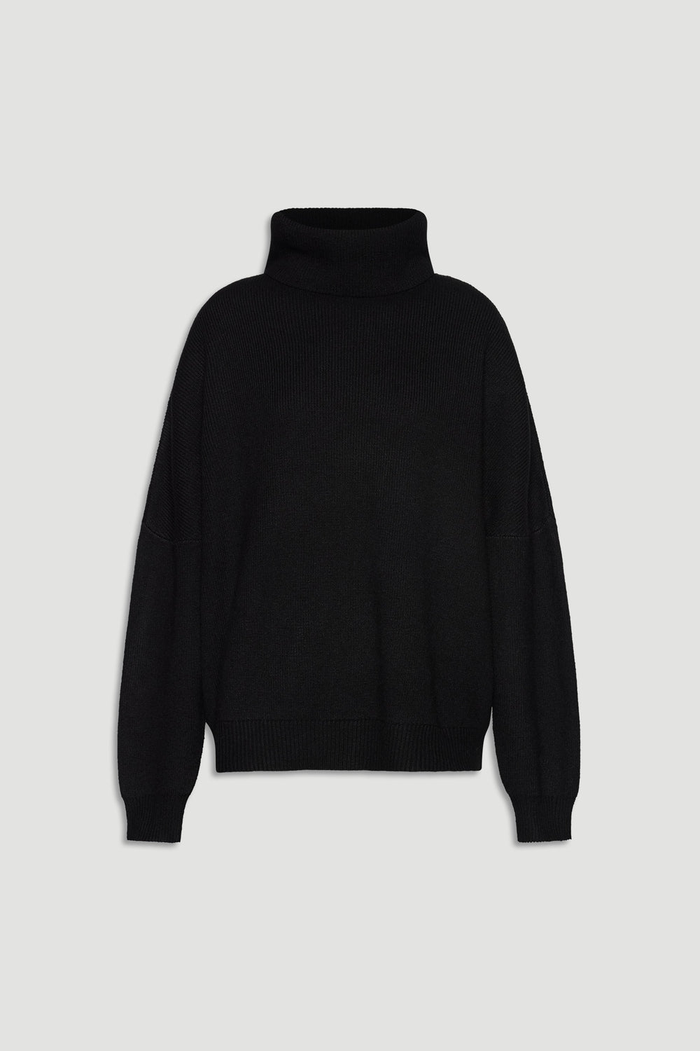 Black roll neck knit jumper with relaxed fit and ribbed cuffs, perfect for effortless, cozy layering.