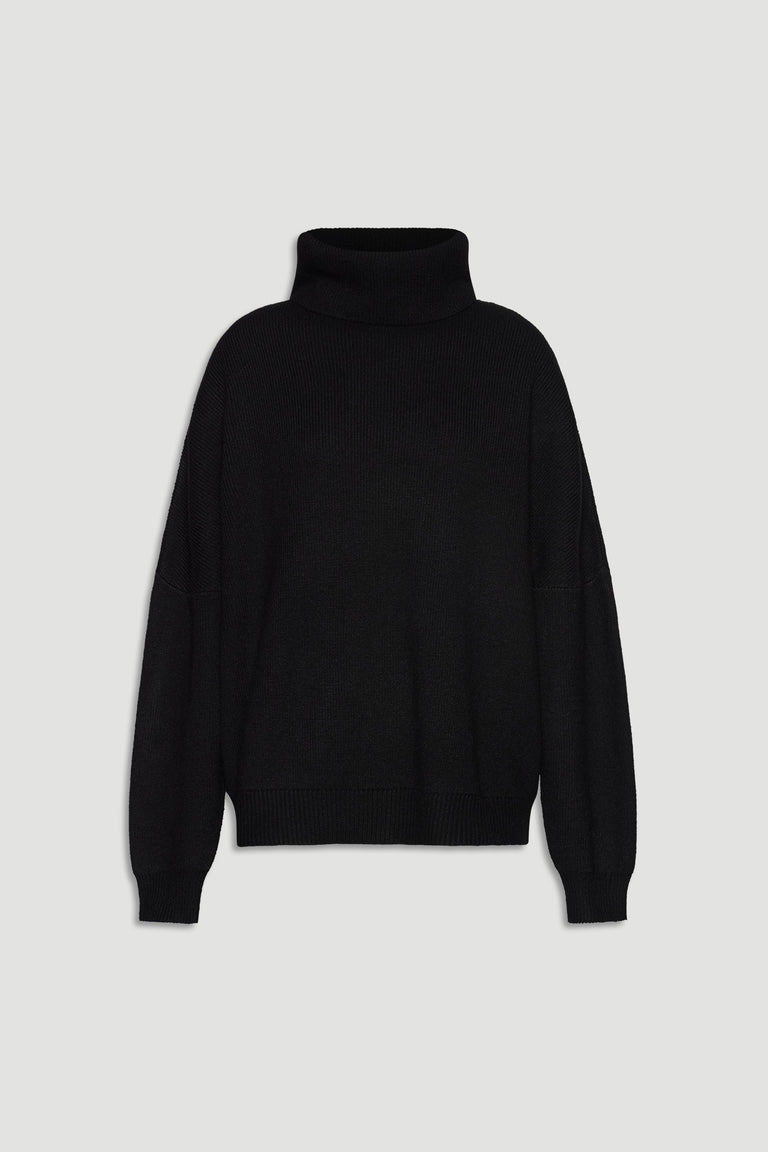 Black roll neck knit jumper with relaxed fit and ribbed cuffs, perfect for effortless, cozy layering.