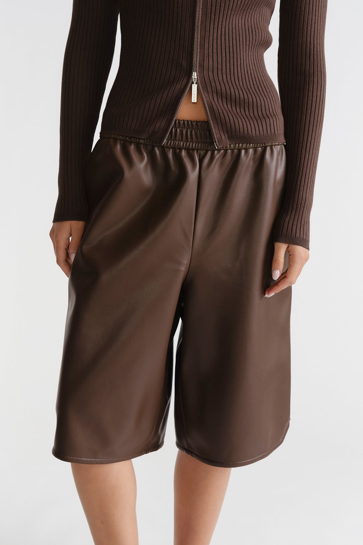 D-Luxe Faux Leather Bermuda in rich chocolate brown with an elastic waistband, crafted by DECJUBA Australian brand