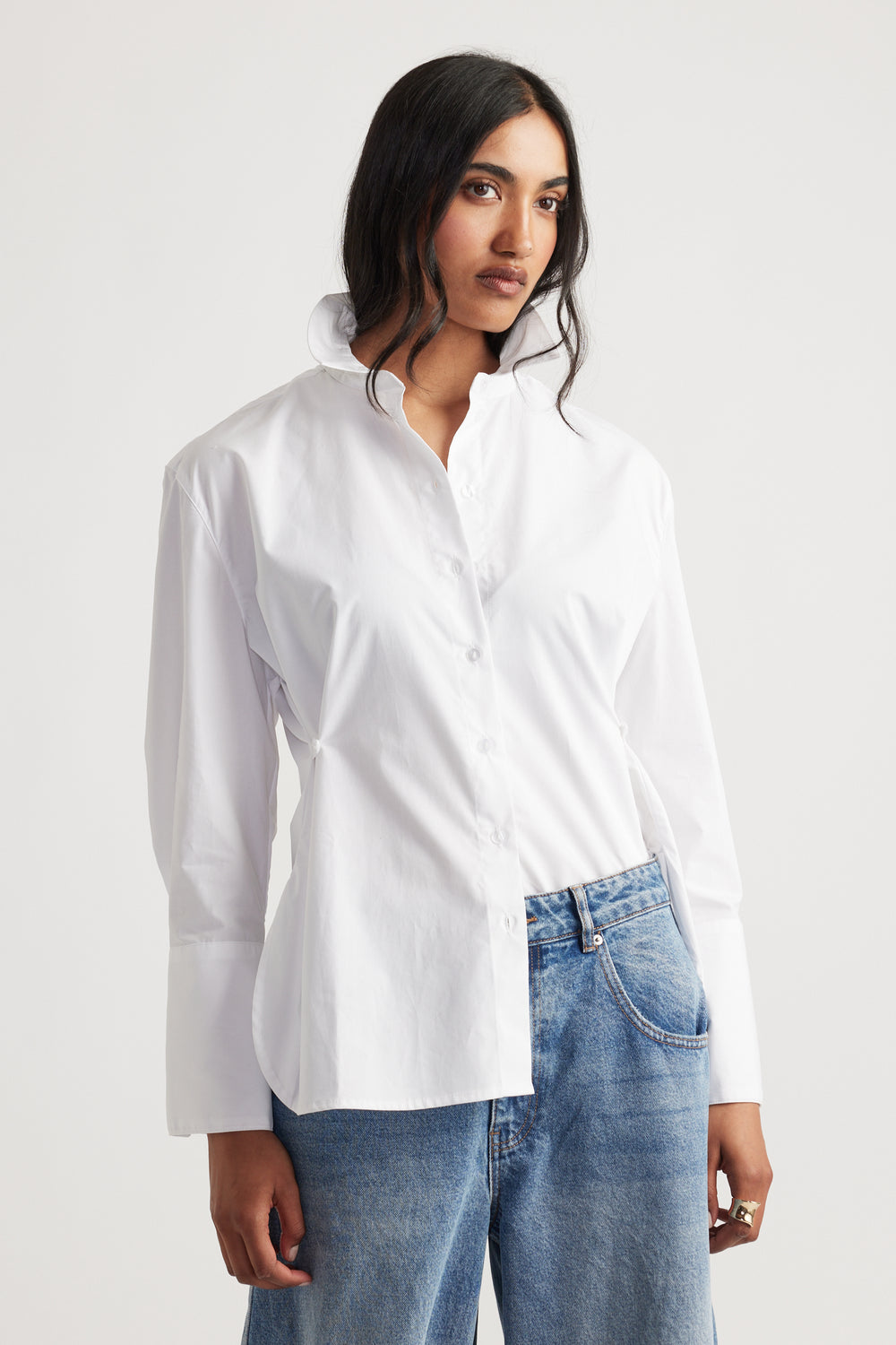 Kristy Side Button Shirt in crisp white with a structured collar and relaxed fit by DECJUBA Australian fashion brand