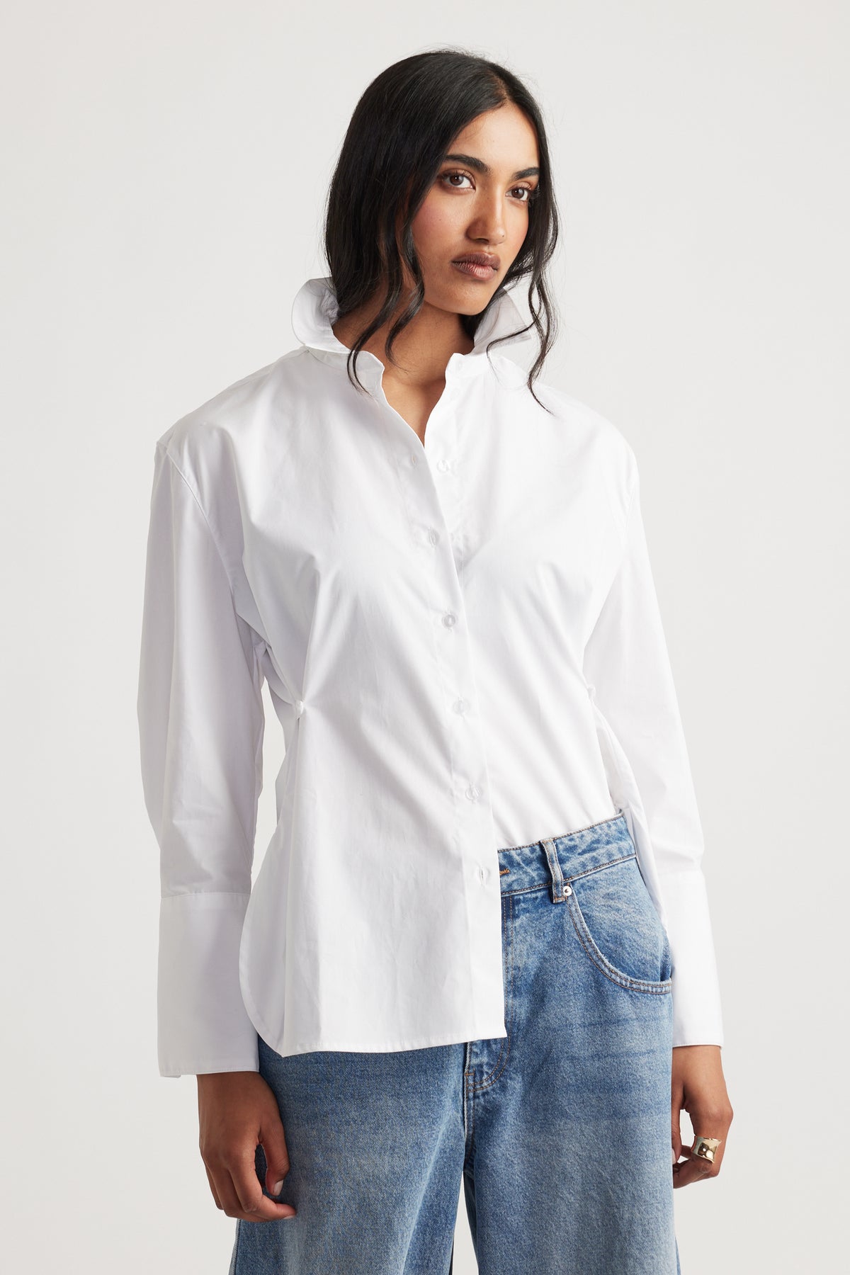 Kristy Side Button Shirt in crisp white with a structured collar and relaxed fit by DECJUBA Australian fashion brand