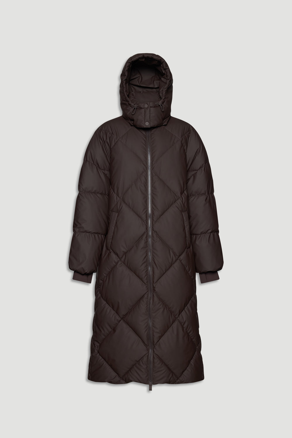 Long dark brown quilted puffer coat with hood and full front zipper, featuring ribbed cuffs for added warmth.
