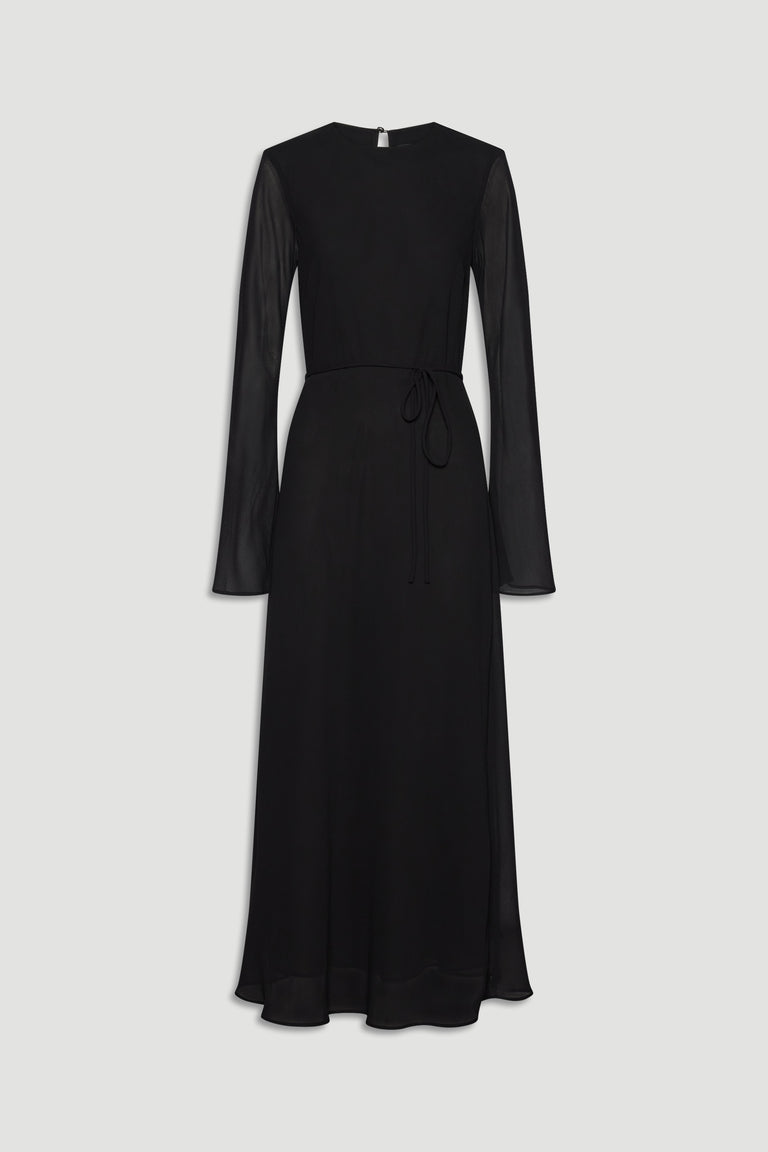 Elegant black maxi dress with sheer long sleeves and a delicate waist tie for a refined, timeless silhouette