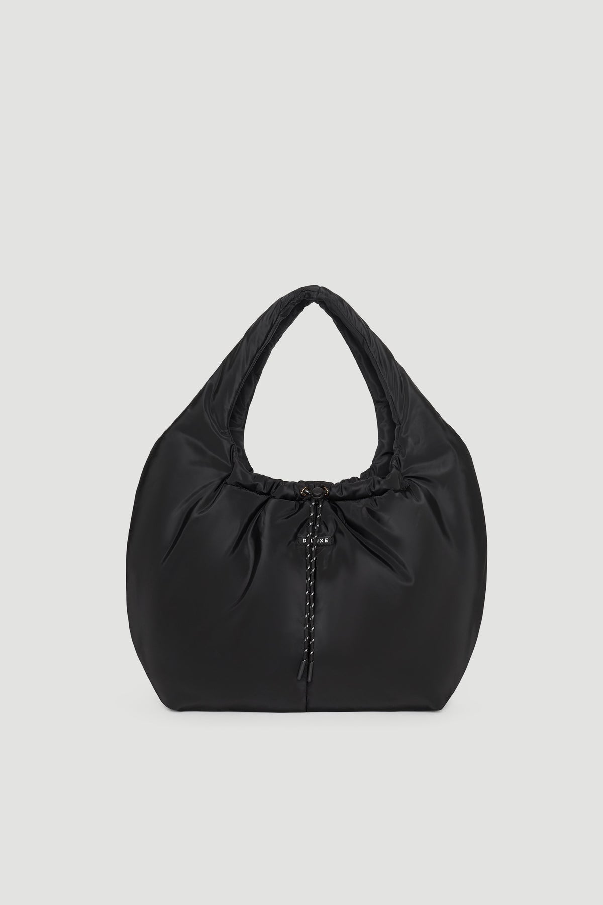 Black padded shoulder bag with soft texture and gathered detail at the center front for a modern look