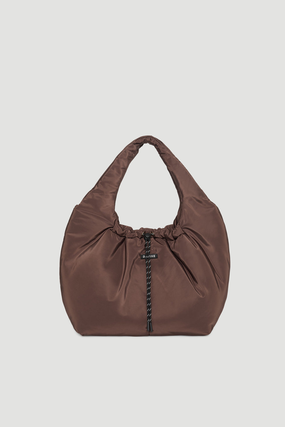 Soft chocolate brown puffer bag with gathered top and thick handle, featuring a black drawstring toggle closure detail