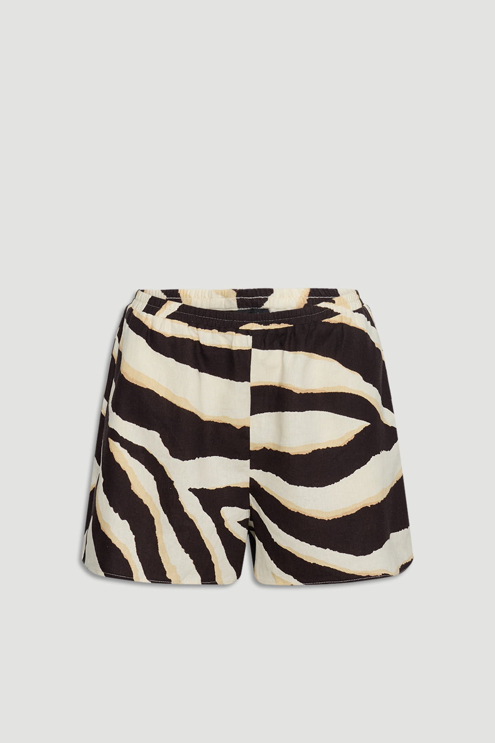 Lightweight shorts with an elasticated waist featuring a bold zebra-inspired black and cream pattern.