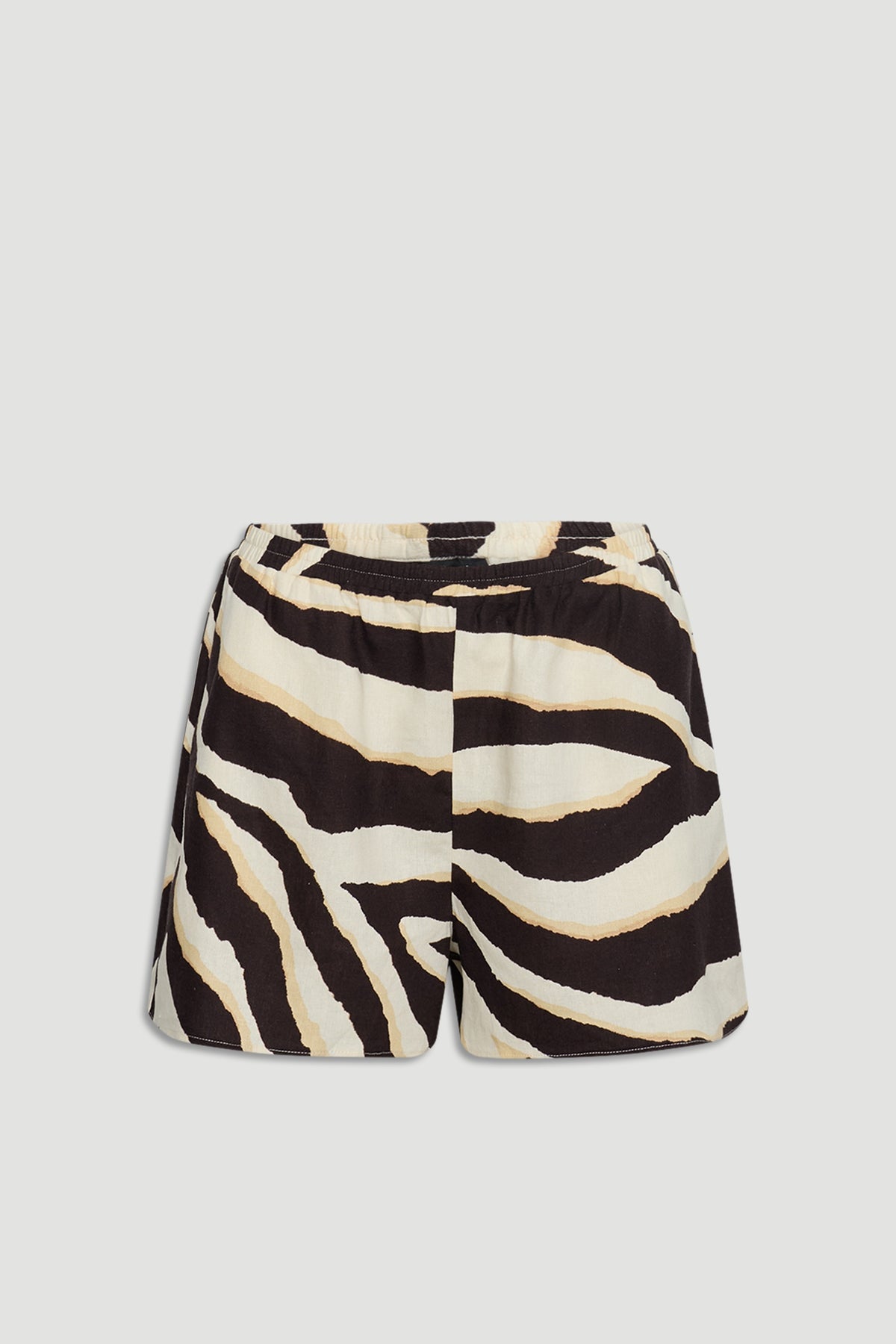 Lightweight shorts with an elasticated waist featuring a bold zebra-inspired black and cream pattern.