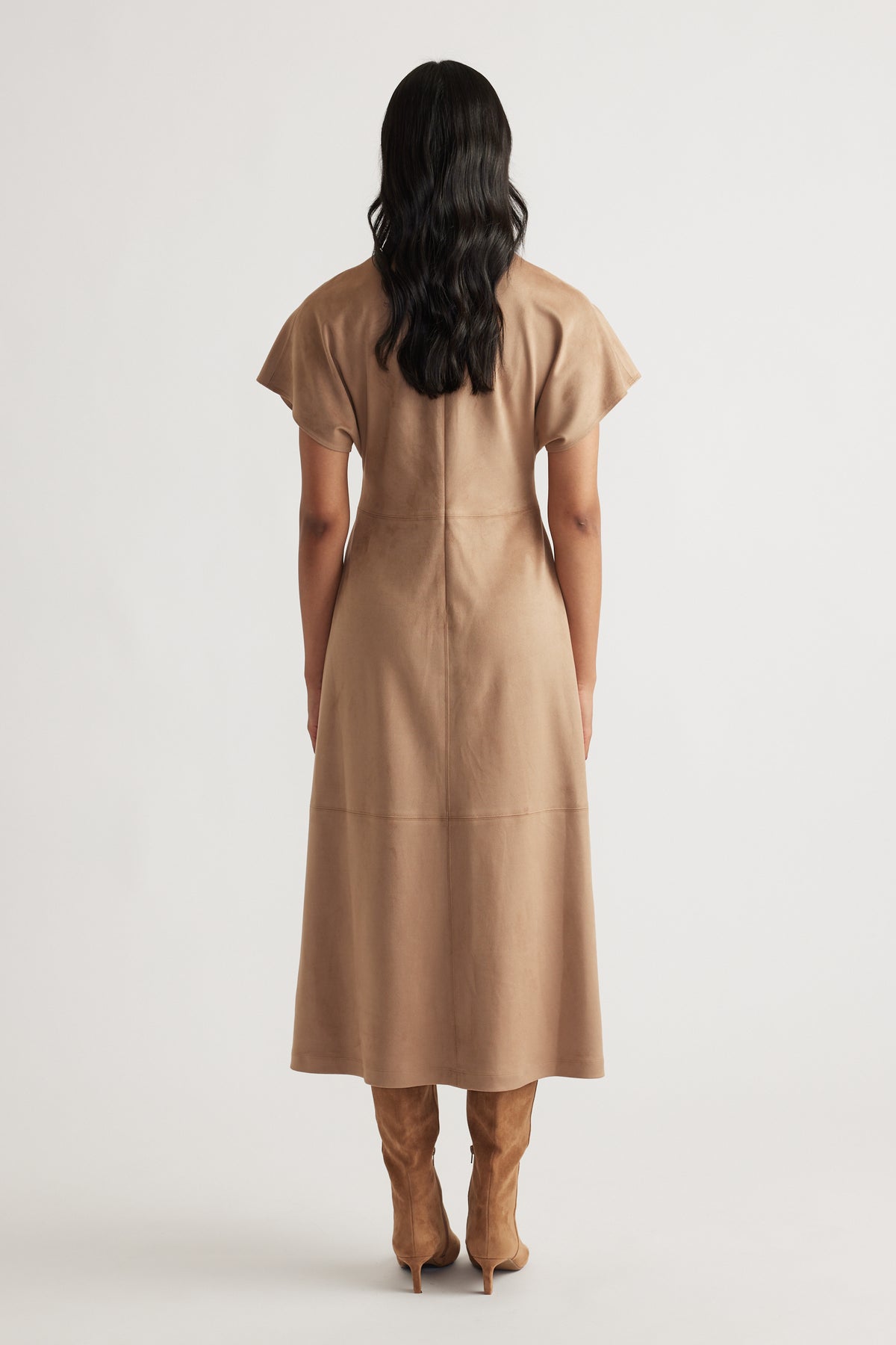 Back view of Clara Faux Suede Midi Dress in warm tan with flutter sleeves, fitted waist, and a flowing midi length from DECJUBA.