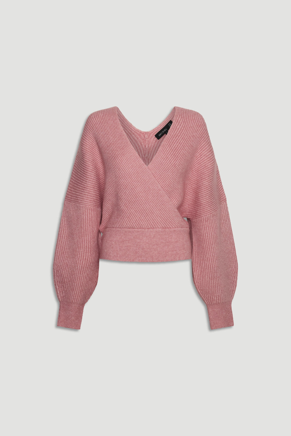 Peony pink crossover knit jumper with balloon sleeves and ribbed hem for a cozy, stylish wardrobe staple