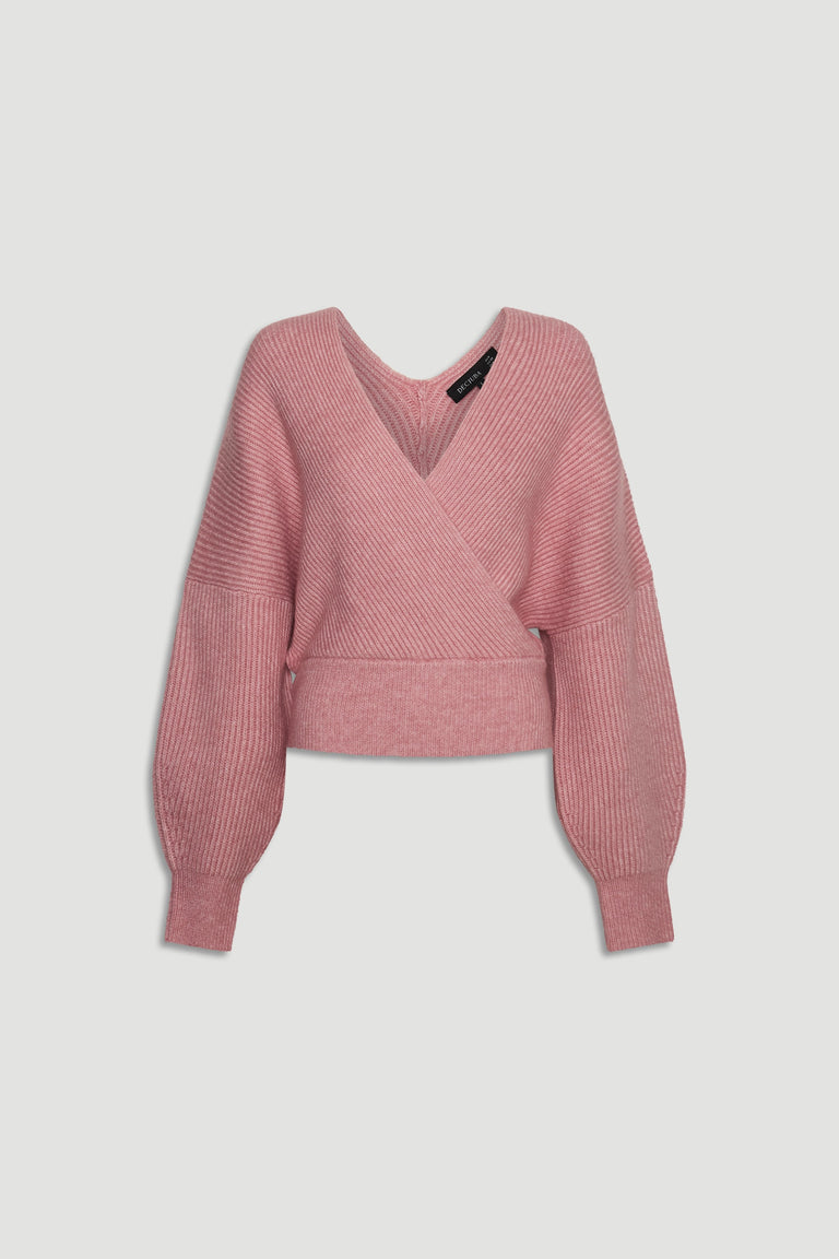 Peony pink crossover knit jumper with balloon sleeves and ribbed hem for a cozy, stylish wardrobe staple