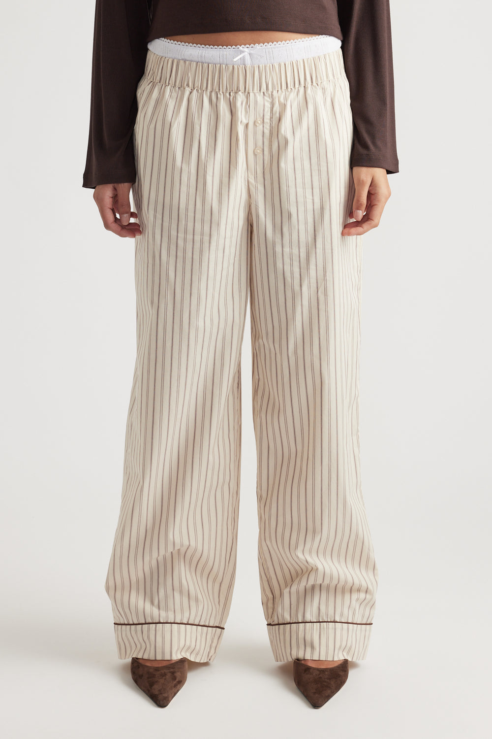 Relaxed fit wide-leg sleep pants in cream with thin vertical chocolate stripes and elastic waistband detail